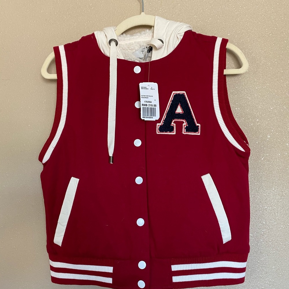Sleeveless varsity jacket